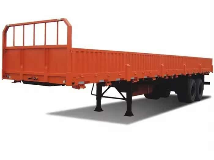 Remolque naranja de paredes laterales duraderas para el transporte de productos agrícolas