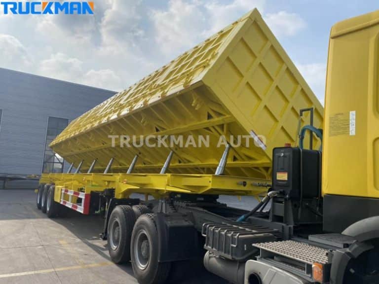 Remolque basculante amarillo tipo U con placa de desgaste de una sola pieza de alta resistencia, ideal para el transporte de todo tipo de materiales a granel