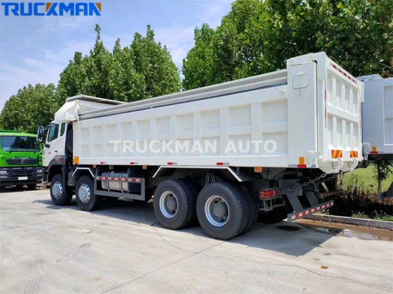 Camión volquete con caja de carga SINOTRUK HOWO de 50 toneladas y 380 CV